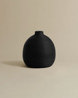 Her Ribbed Vase